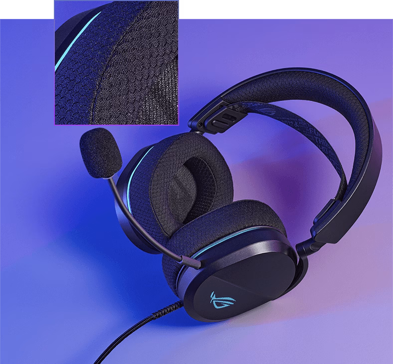 ASUS ROG Pelta Core gaming headset with a dedicated close-up shot emphasizing the premium mesh fabric texture of the ear cups.